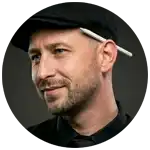 Portrait of Freelance Digital Product Designer Christoph Gey with an Apple Pencil behind his ear